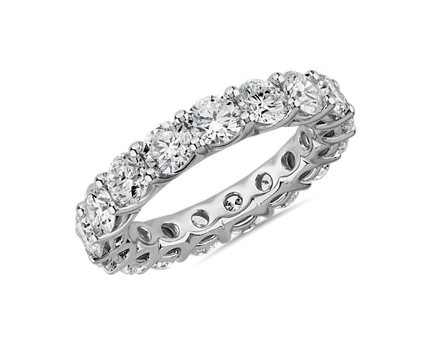 Featuring a timeless low dome design in softly lustrous 14k white gold, this eternity ring is a romantic statement piece. It features a breathtaking 4 ct. tw. in lab-grown diamonds encircling the band.