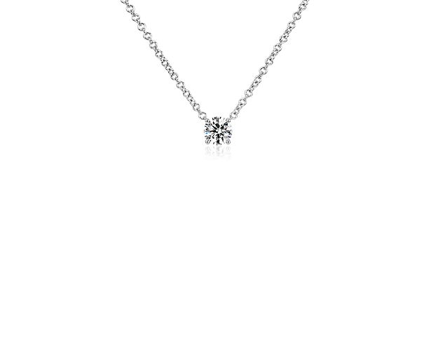 A gorgeous floating lab-grown diamond promises breathtaking sparkle whenever you wear this elegantly simple pendant. The graceful 14k white gold setting is design to highlight the beauty of the single solitare stone.