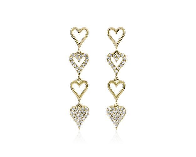 Exude luxurious romance when you wear these stunning drop earrings featuring four dangling hearts crafted in lustrous 14k yellow gold. Delicate diamonds add sparkle to every other heart for a stunning alternating look.