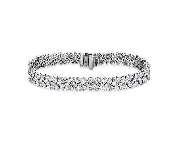 This stunning tennis bracelet features multiple fancy shape diamonds, with round, pear and marquise-cut stones nestled along it in a brilliant symphony of sparkle. It features luxurious 14k white gold design to ensure lasting quality.