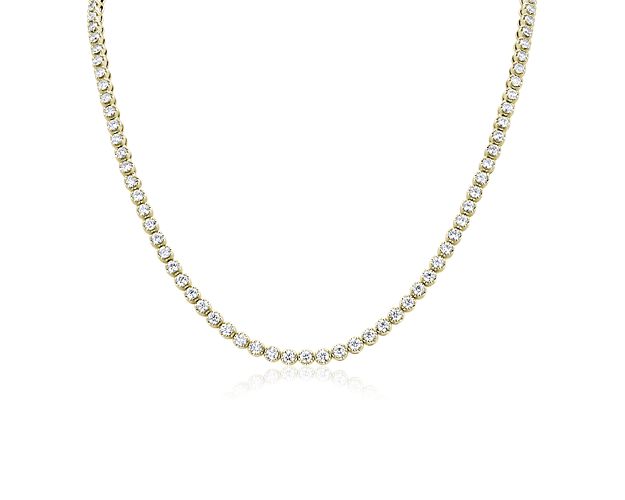 Complete your ensemble with this timelessly elegant eternity necklace, set with stunning round-cut diamonds that promise plenty of sparkle. The warm gleam of the 14k yellow gold completes the design with a luxurious finish.