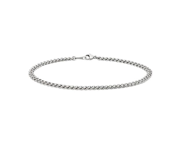 This classic Miami Cuban link bracelet is crafted in platinum. This timeless pieces is great for everyday wear, and is a classic staple. This bracelet is secured with a lobster claw clasp.