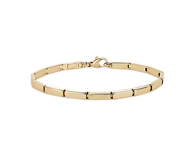 This beautiful bracelet made of 14k yellow gold features polished gold baguettes that are perfect to wear alone or add to your stack.