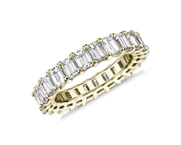 A continuous circle of emerald-cut diamonds gives this 4 ct. tw. eternity ring a modern sophistication. Works beautifully as a wedding ring or anniversary gift. Add it to a stack of other eternity rings for an on-trend right hand look.