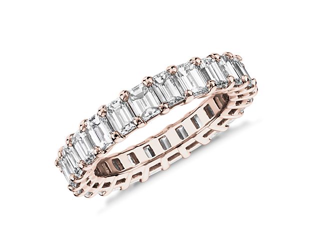 A continuous circle of emerald-cut diamonds gives this 4 ct. tw. eternity ring a modern sophistication. Works beautifully as a wedding ring or anniversary gift. Add it to a stack of other eternity rings for an on-trend right hand look.