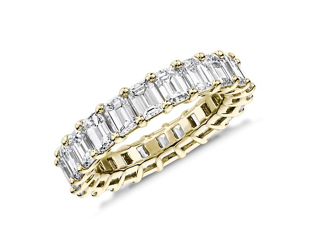 A continuous circle of emerald-cut diamonds gives this 5 ct. tw. eternity ring a modern sophistication. Works beautifully as a wedding ring or anniversary gift. Add it to a stack of other eternity rings for an on-trend right hand look.