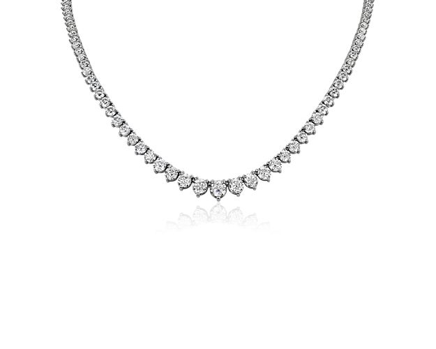 Sparkle entering a room when you wear this stunning eternity necklace featuring brilliant graduating diamonds along its length, giving it dramatic shimmer. It features an 18k white gold design that promises enduring luxurious style and quality.