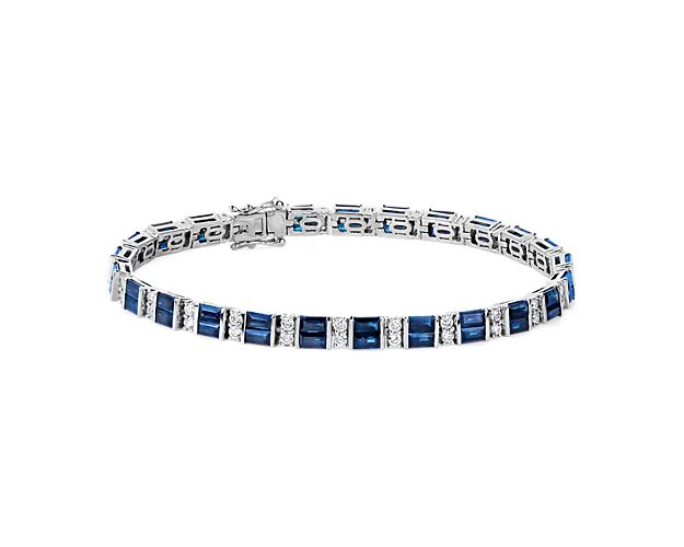 Exquisite in every way, this exceptional blue sapphire and diamond bracelet showcases brilliant baguette cut sapphires with diamond accents set in 14k white gold.