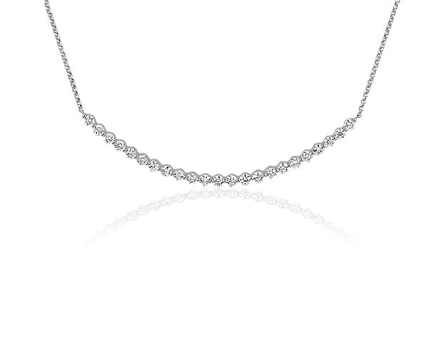 Bring a smile to every situation with brilliant round diamonds tracing the elegant curve of this 14k white gold necklace. Its subtle sparkle brings the perfect pinch of glamour to yoga, cocktail hour and everything in between.