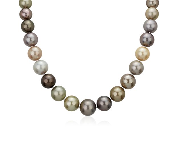 Lustrous and decadent, this pearl necklace showcases varying hues of Tahitian cultured pearls to create a unique necklace finished with an 18k white gold diamond encrusted clasp.