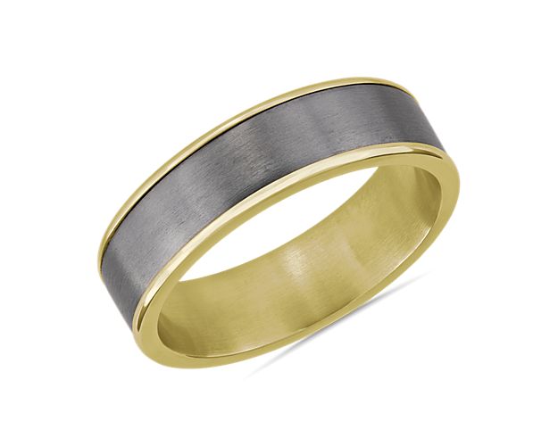 An inlay of tantalum framed by 14k yellow gold defines the timeless and elegant lines of this wedding ring, making it the perfect expression of enduring love.