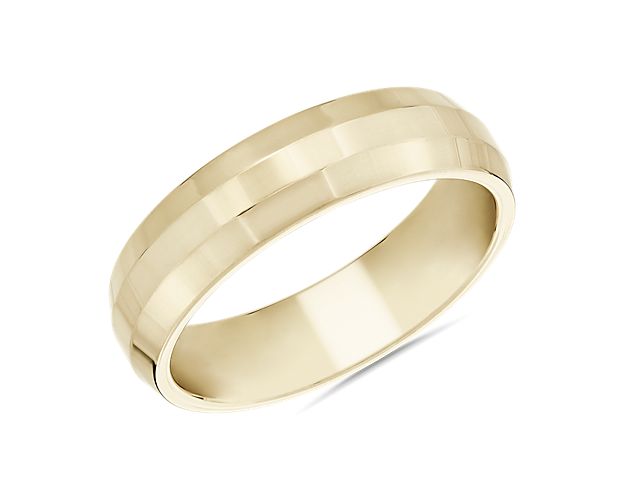 Crafted from 14k yellow gold, this Zac Posen plain band is a timeless classic that exudes simple sophistication. The beveled edge gives it a hint of contemporary charm.