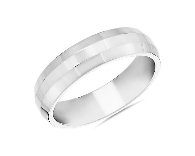 Express eternal love in timeless style with this elegantly simple Zac Posen plain band ring. Luxurious 14k white gold gives it a bright, gleaming look, and the beveled edge adds a contemporary touch.