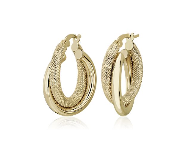 Crafted from beautifully gleaming 14k Italian yellow gold, these earrings feature gracefully entwined double hoops for a timelessly sophisticated look.