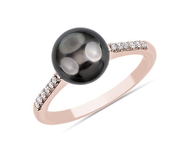 Elegantly subversive, this rose gold ring combines warm metal with twinkling diamonds framing a dramatic onyx Tahitian pearl for a look that wears well day and night.