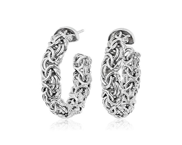 These Byzantine hoop earrings are voluminous yet lightweight, making for very comfortable wear.  Italian sterling silver links are intricately woven into this distinctive pattern.