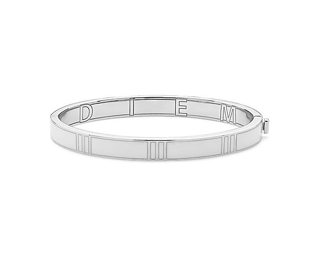 Seize the day in style when stacking on this sterling silver bracelet designed with trios of parallel lines interrupted by bright white enamel details.
