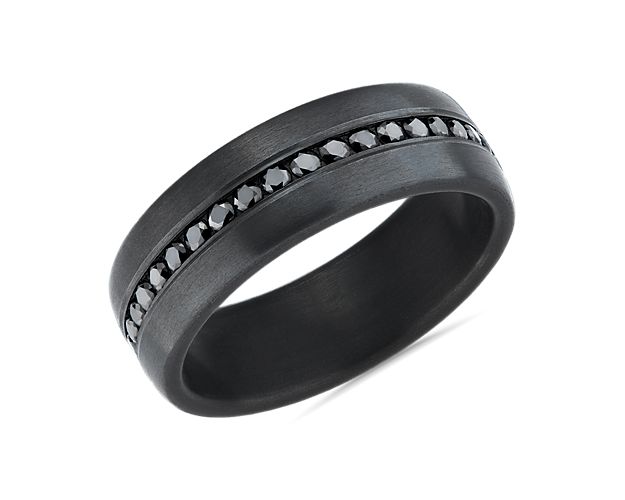 Find dark beauty in the deep tones of this tantalum wedding band. It's made with a satin finish that surrounds a row of black diamonds inlaid in the top half of the ring for subtle sparkle.