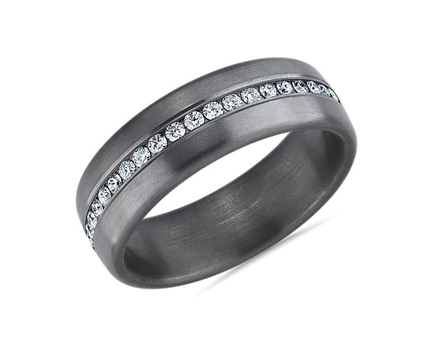 For those who seek something a little different, this gray tantalum wedding band features a satin finish and a flushly set row of white diamonds on the top half of the ring.
