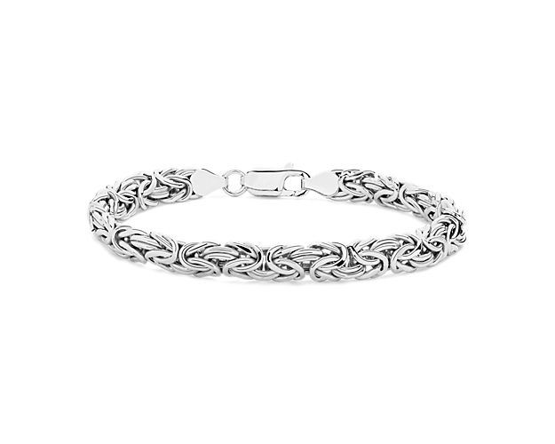 Recalling the richness of a bygone era, our classic Byzantine bracelet is crafted to be both voluminous and lightweight with highly polished, Italian hollow sterling silver links intricately woven in a distinctive pattern. The bracelet lays flat for comfortable wear and features a sturdy clasp for security.