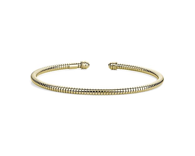 A ray of sunshine for your wrist with a twist, this 14k Italian yellow gold cuff brings effortless, textural style to your bracelet stack.