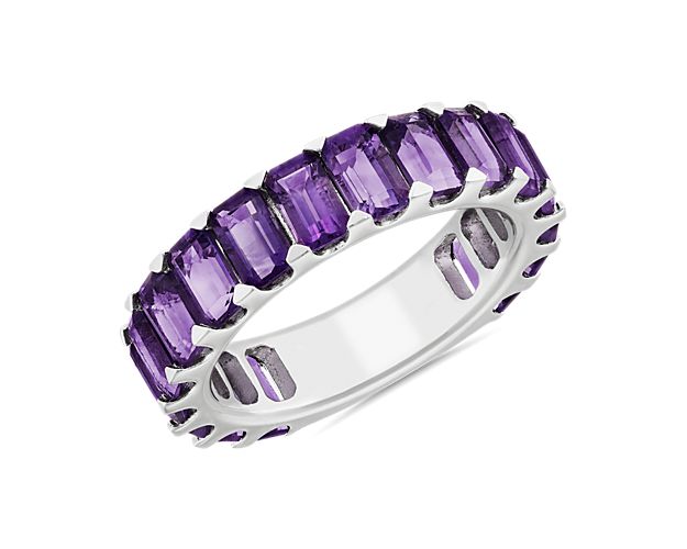 Perfect for big moments and every day after, this sterling silver eternity band sparkles with an unbroken string of octagon-shaped amethysts for a vibrant style that commands any ring stack.