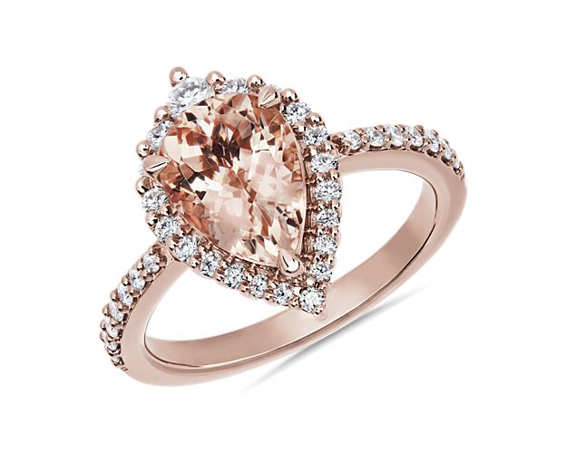 Summon second glances with this gorgeous ring featuring a pear shaped morganite boasting a dreamy pink hue. A sparkling halo adds beautiful shimmer to complete the look.