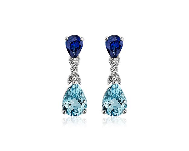 You'll love the interplay of soft and rich colors between the different gems on these beautiful pear shaped aquamarine, sapphire, and diamond drop earrings.