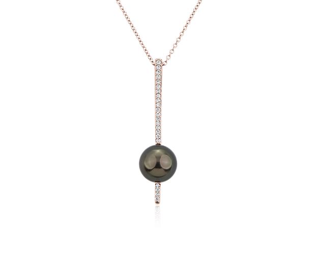 Warm 14k rose gold and shimmering stones highlight the mesmerizing black hue of this pendant necklace's Tahitian pearl as its dangles elegantly at the silhouette's center.