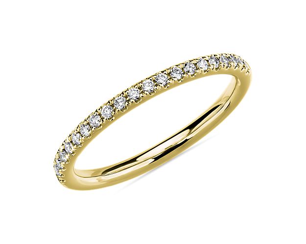 Romance personified. Warm 18k yellow gold captures light sending its dazzling radiance into a row of brilliant pavé set diamonds.