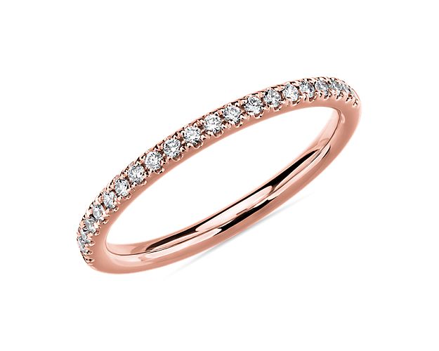 Romance personified. Blushing 14k rose gold captures light sending its dazzling radiance into a row of brilliant pavé set diamonds.