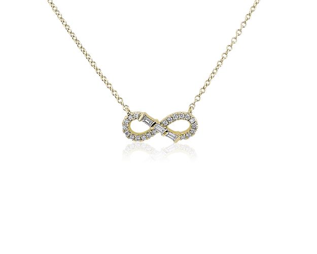 For a love that spans lifetimes, this 14k white gold necklace perfectly expresses your affection with its infinite symbol shape trimmed with round stones that meet at a trio of emerald-cut gems at its center.