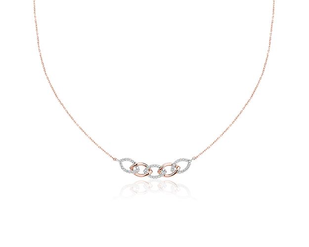 Romantic rose gold and diamond-studded white gold links create the perfect on-trend piece to add sparkle and shine to any outfit.