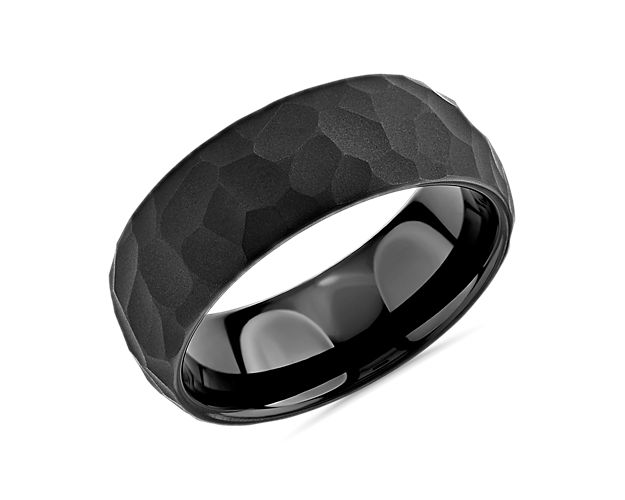 Modern in design, this edge-to-edge hammered wedding ring features durable tungsten for a unique look.