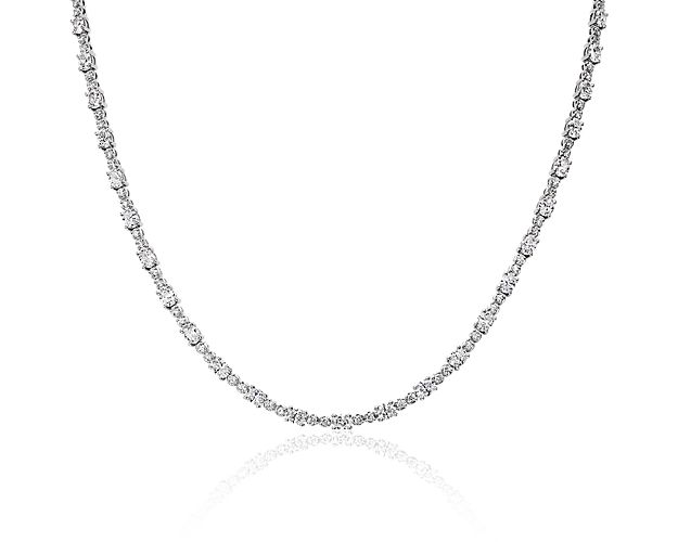 Elegant and sophisticated, this 14k white gold necklace possesses endless sophistication with round and oval diamonds in an unbroken eternity style of luminous beauty.