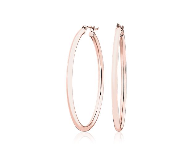 A style essential, these medium hoop earrings are crafted from 14k rose gold tubing for a polished, lightweight look and finished with a latch back closure.