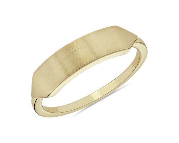 Inspired by classic ID bracelets, this charming minimalist ring features a design of gleaming 14k yellow gold finished with a smooth, open band. Please note that this ring cannot be engraved.