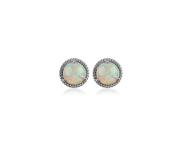 Show off a classic with these opal gemstone earrings, framed in sterling silver and finished off with elegant rope detailing.