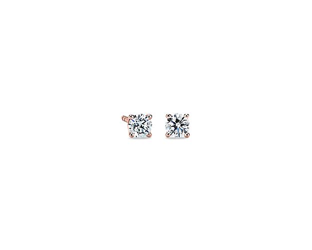 The classic stud earring gets a modern makeover as light dances across the diamonds set in blushing rose gold.