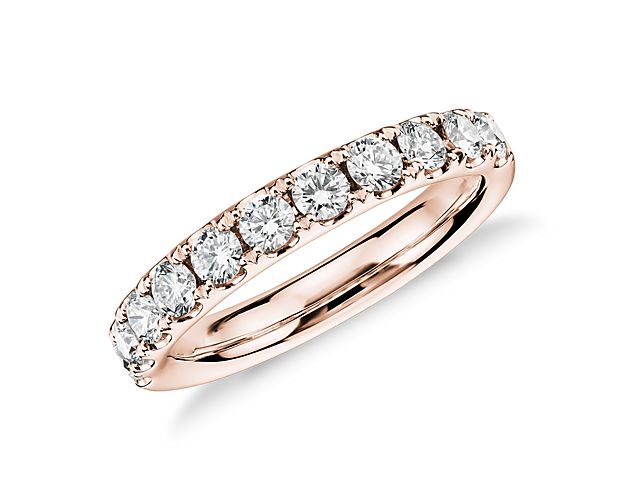 Shine bright with the elegant beauty of this 14k rose gold diamond ring adorned with a row of dazzling pavé-set round diamonds.