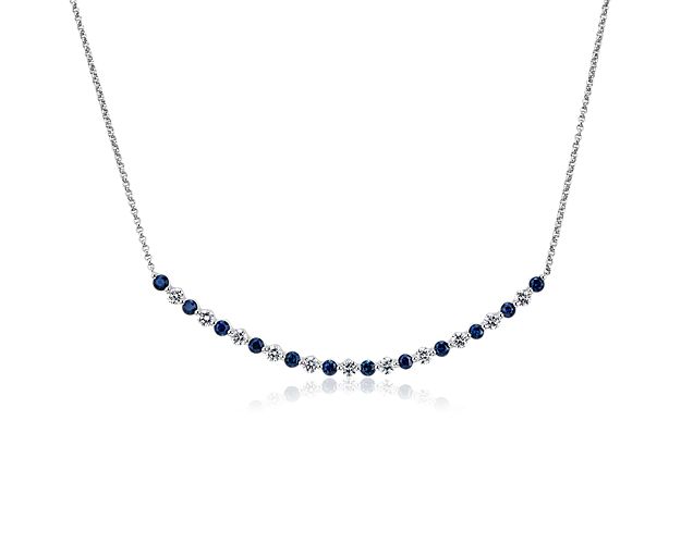 This floating style smile necklace features a delicate row of alternating vibrant blue sapphires and round brilliant diamonds set in 14k white gold. Its subtle sparkle will bring the perfect touch to your jewelry collection.