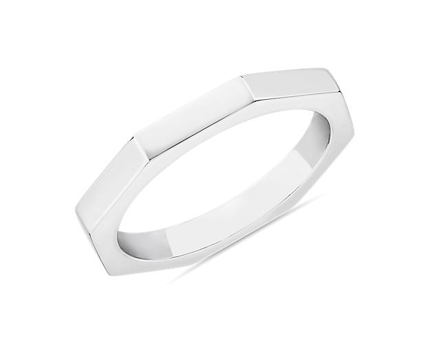 Commemorate your special day with this gorgeously simple wedding band featuring sleek geometric design. The 14k white gold design gives the angled sides an eye-catching luster.