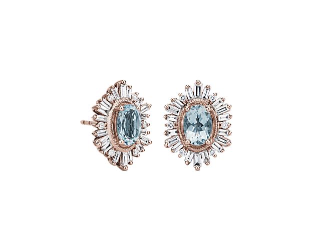 Lend a little shimmer to your style as these beautiful stud earrings catch the light and show off the azure hue of the aquamarine stones. Beautifully intricate halos of baguette-cut diamonds accentuate the centre stones with luxurious sparkle.