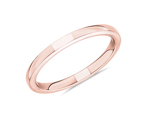 A subtle statement of your enduring love, this 14k rose gold ring evokes sleek and contemporary style as it contours to your finger for a comfortable fit.