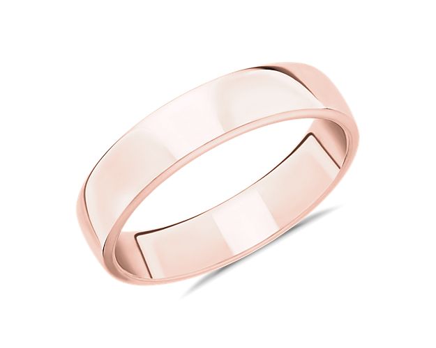 With its sleek design and contemporary lines, this 14k rose gold ring honors the deep love and commitment you share as it sits comfortably on your finger for years to come.