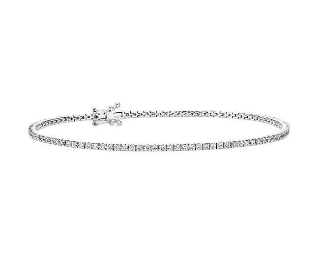 Flash your brilliant style with an infinitely wearable classic! This tennis bracelet showcases 100 diamonds prong-set in 14k white gold. Wear this all-occasion dazzler securely with a box clasp with safety.