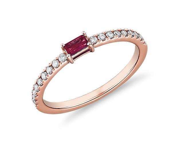 Regal in appearance and exuding incredible warmth, this 14k rose gold ring is embellished with a baguette-cut ruby center stone and pavé-set diamonds running down each side of the band. Due to this ring's delicate nature, we do not recommend for daily wear and are unable to resize or repair.
