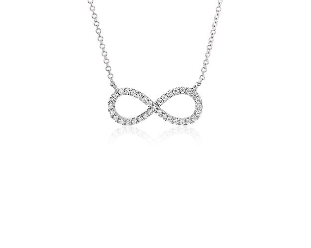 Infinity is a subtle symbol of eternal love. This delicate necklace features 1/4 ct. tw. of pavé diamonds set in 14k white gold and hangs from an 18-inch cable chain. An excellent gift choice that speaks volumes.