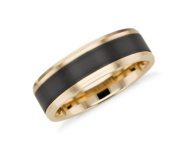 This 14k yellow gold wedding ring is inset with a band of lightweight titanium. The polished finish on the yellow gold is smooth, which balances nicely against the satin black titanium.