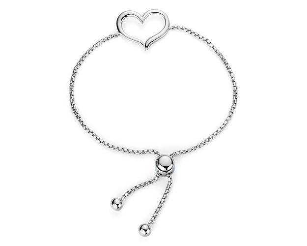 Symbolic of your love, this sterling silver bracelet can be adjusted in length for the perfect fit, and features an open-heart design set in a box chain secured by bolo clasp.